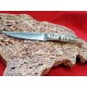 Coltello tipo dorgalese con manicatura animata in corno muflone